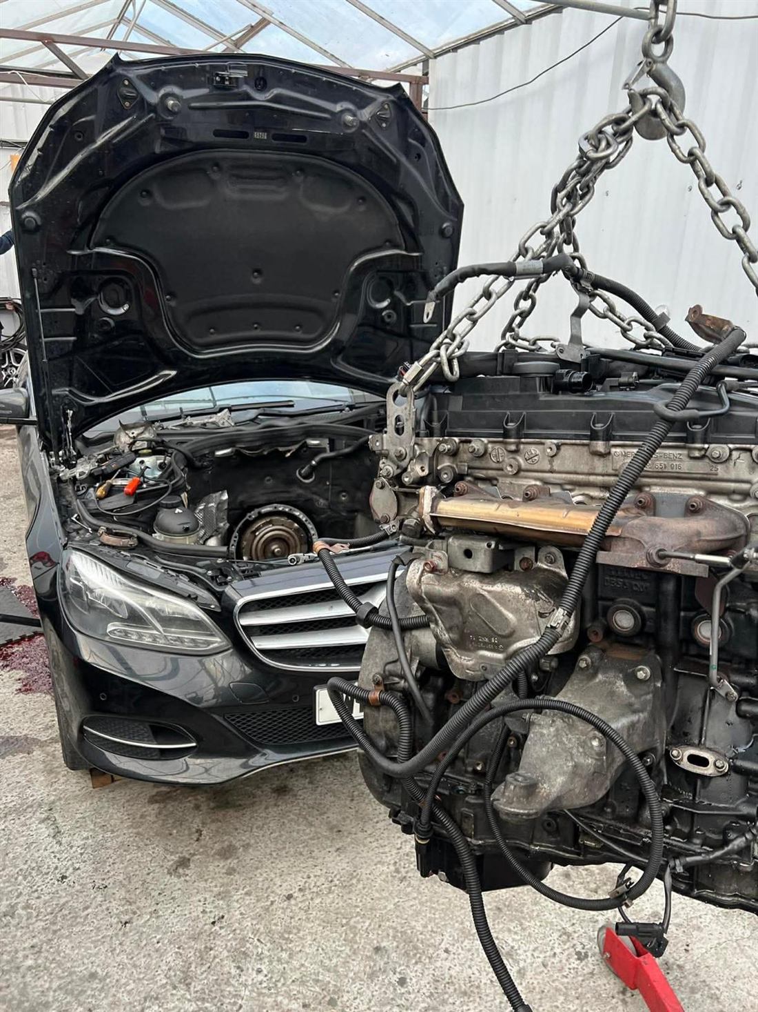Engine swap on a Mercedes E-Class